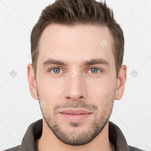 Neutral white young-adult male with short  brown hair and grey eyes