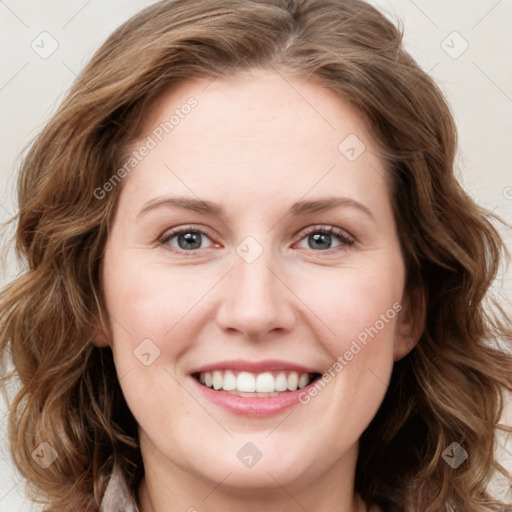 Joyful white young-adult female with medium  brown hair and green eyes