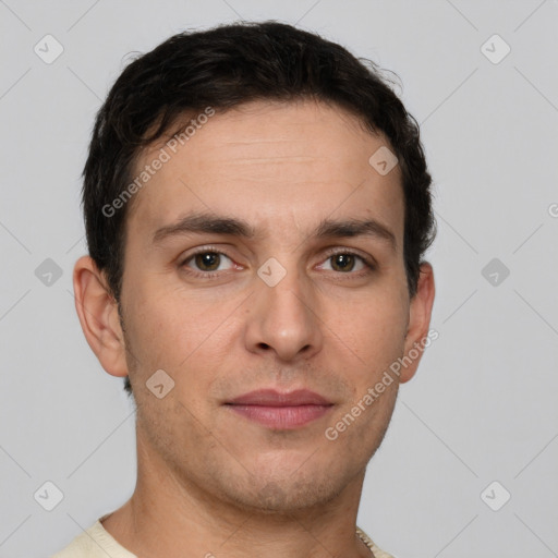 Joyful white young-adult male with short  brown hair and brown eyes