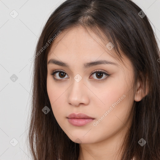 Neutral white young-adult female with long  brown hair and brown eyes