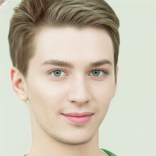 Joyful white young-adult male with short  brown hair and green eyes