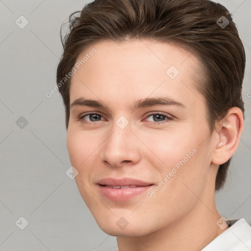 Joyful white young-adult female with short  brown hair and brown eyes