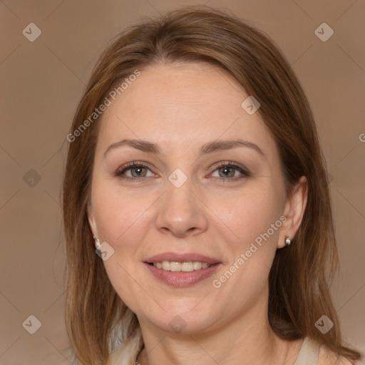 Joyful white adult female with medium  brown hair and brown eyes