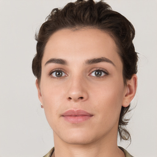 Neutral white young-adult female with short  brown hair and brown eyes