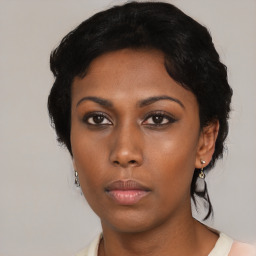 Neutral black young-adult female with short  black hair and brown eyes