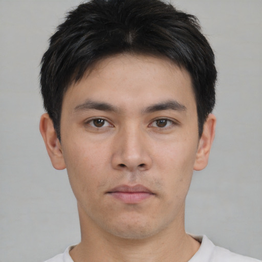 Neutral asian young-adult male with short  brown hair and brown eyes