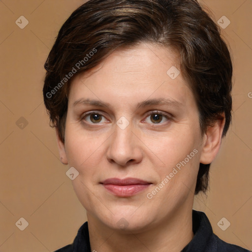 Joyful white adult female with medium  brown hair and brown eyes