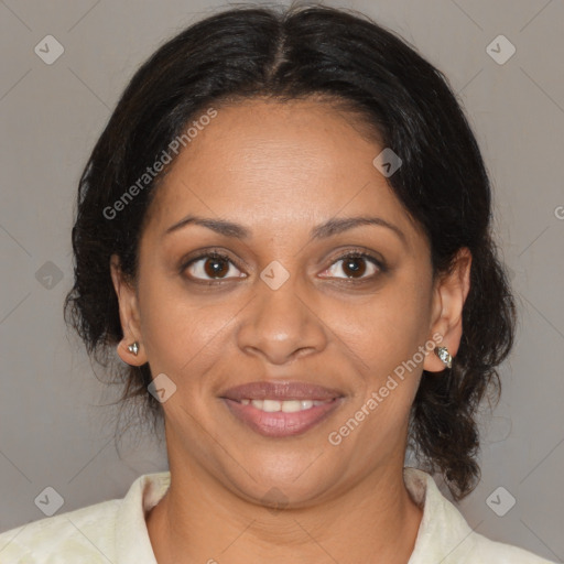 Joyful black adult female with medium  brown hair and brown eyes