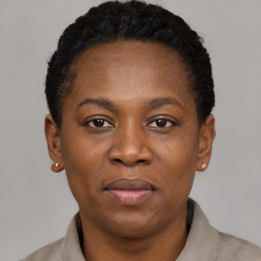 Neutral black adult female with short  black hair and brown eyes