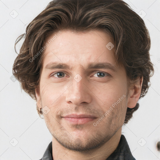 Joyful white adult male with short  brown hair and grey eyes