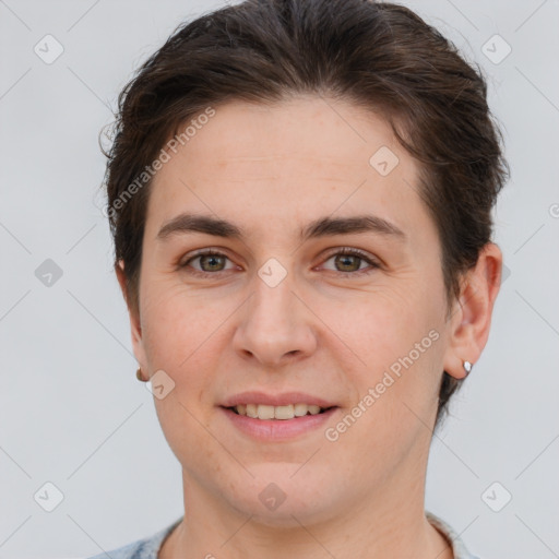 Joyful white young-adult female with short  brown hair and brown eyes