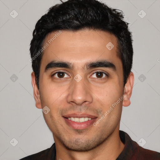 Joyful white young-adult male with short  black hair and brown eyes