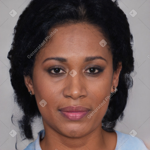 Joyful black adult female with medium  brown hair and brown eyes