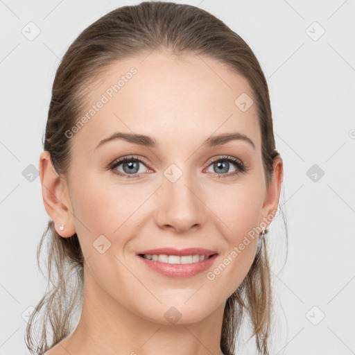 Joyful white young-adult female with long  brown hair and grey eyes