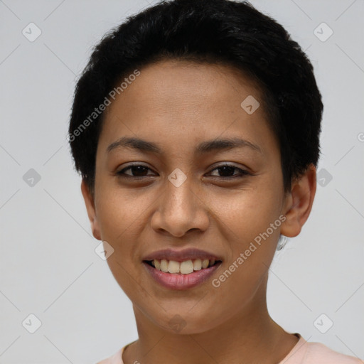 Joyful latino young-adult female with short  black hair and brown eyes