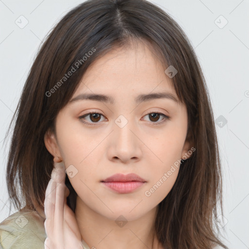 Neutral white young-adult female with medium  brown hair and brown eyes