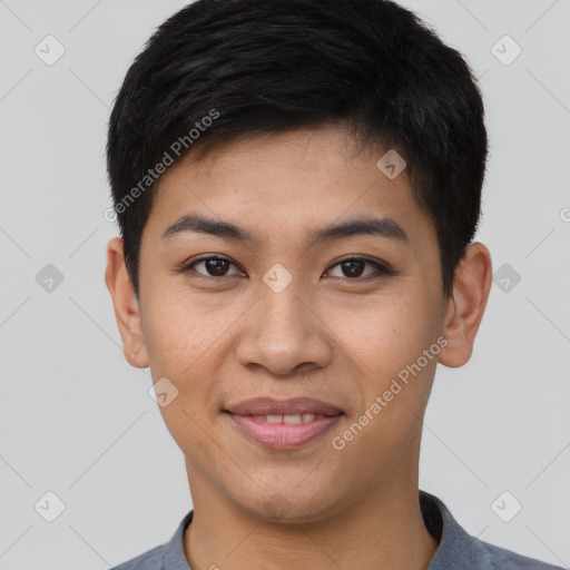 Joyful asian young-adult male with short  brown hair and brown eyes