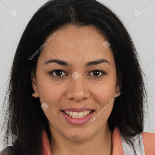 Joyful latino young-adult female with long  brown hair and brown eyes