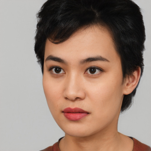 Neutral asian young-adult female with medium  black hair and brown eyes