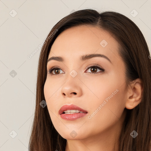 Neutral white young-adult female with long  brown hair and brown eyes