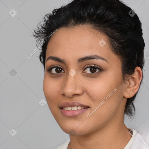 Joyful latino young-adult female with medium  black hair and brown eyes