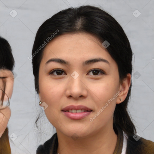 Joyful asian young-adult female with medium  brown hair and brown eyes