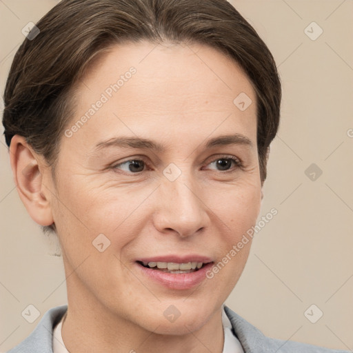 Joyful white adult female with short  brown hair and grey eyes