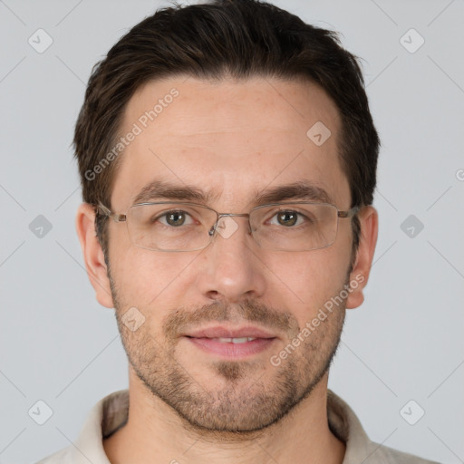 Joyful white adult male with short  brown hair and brown eyes