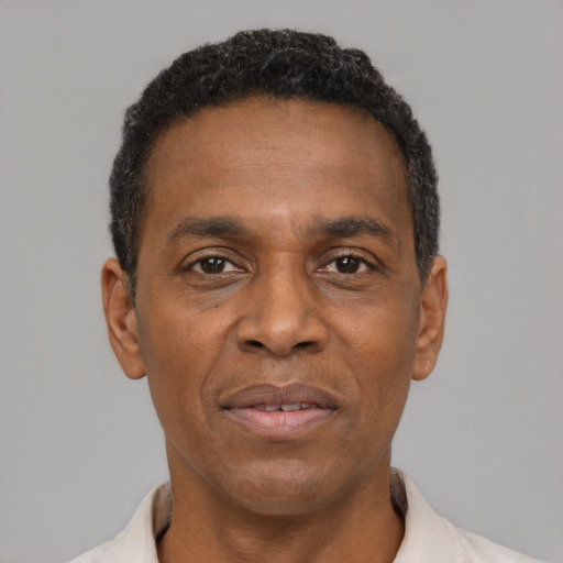 Neutral black adult male with short  black hair and brown eyes