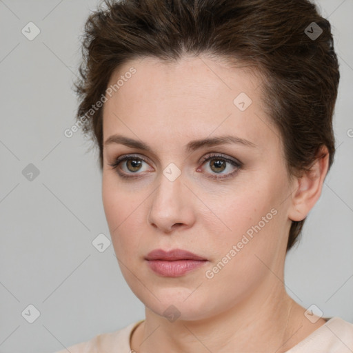 Neutral white young-adult female with medium  brown hair and green eyes