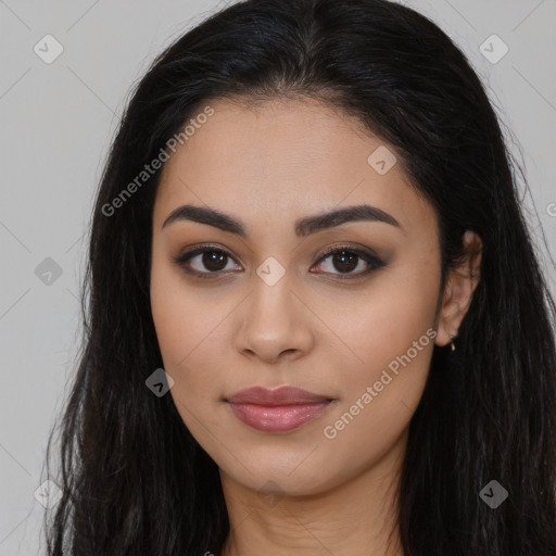 Joyful latino young-adult female with long  brown hair and brown eyes