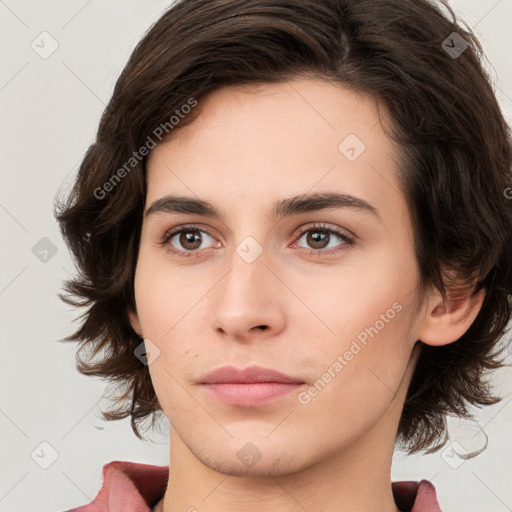 Neutral white young-adult female with medium  brown hair and brown eyes