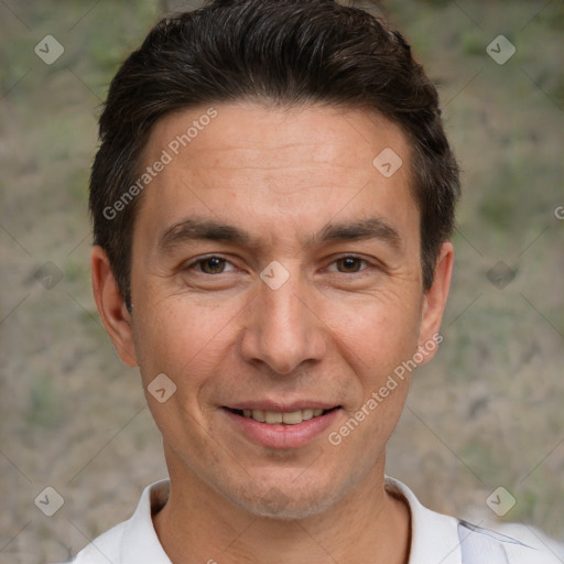 Joyful white adult male with short  brown hair and brown eyes