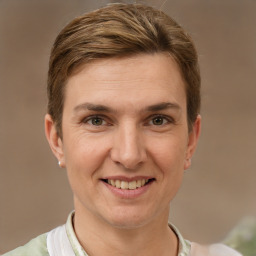 Joyful white adult female with short  brown hair and brown eyes