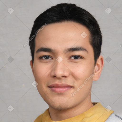 Joyful white young-adult male with short  black hair and brown eyes