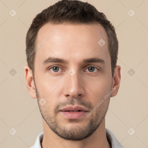 Neutral white young-adult male with short  brown hair and brown eyes