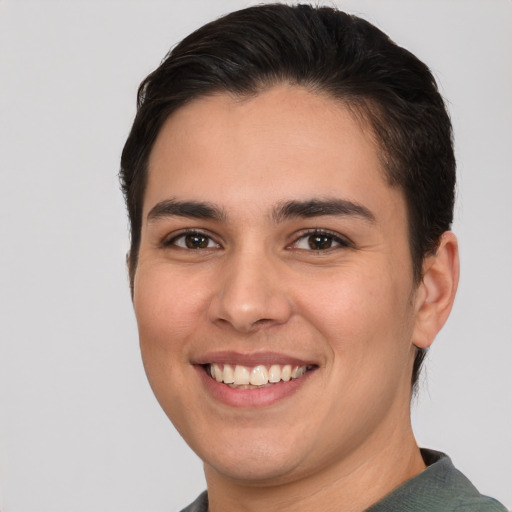 Joyful white young-adult male with short  brown hair and brown eyes