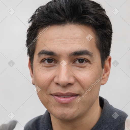 Joyful white adult male with short  black hair and brown eyes