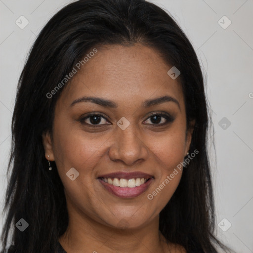 Joyful black young-adult female with long  brown hair and brown eyes