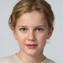 Joyful white child female with short  brown hair and grey eyes