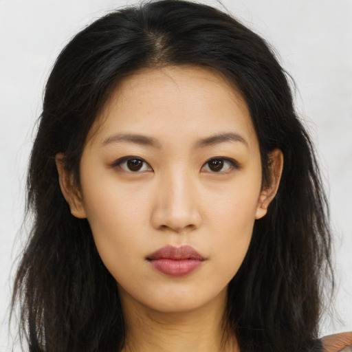 Neutral asian young-adult female with long  brown hair and brown eyes