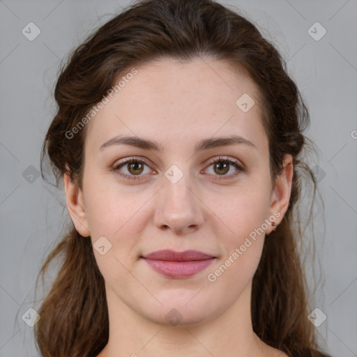 Joyful white young-adult female with medium  brown hair and green eyes