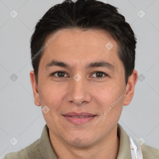 Joyful white adult male with short  brown hair and brown eyes