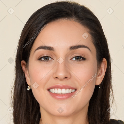 Joyful white young-adult female with long  brown hair and brown eyes