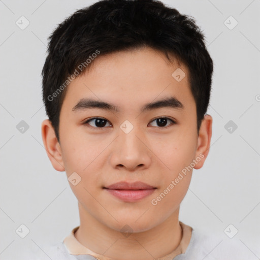 Joyful asian young-adult male with short  brown hair and brown eyes