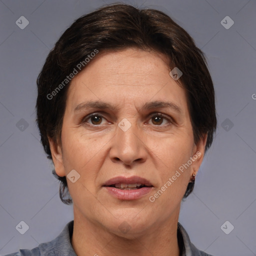 Joyful white adult female with short  brown hair and brown eyes