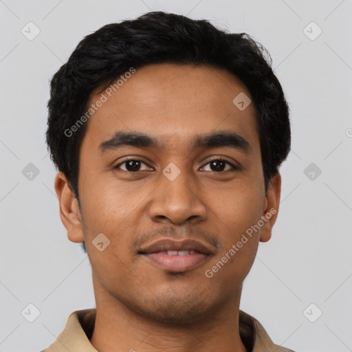 Joyful latino young-adult male with short  black hair and brown eyes