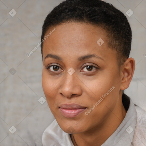 Joyful black young-adult female with short  brown hair and brown eyes