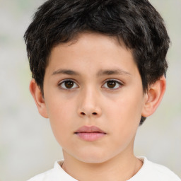 Neutral white child male with short  brown hair and brown eyes