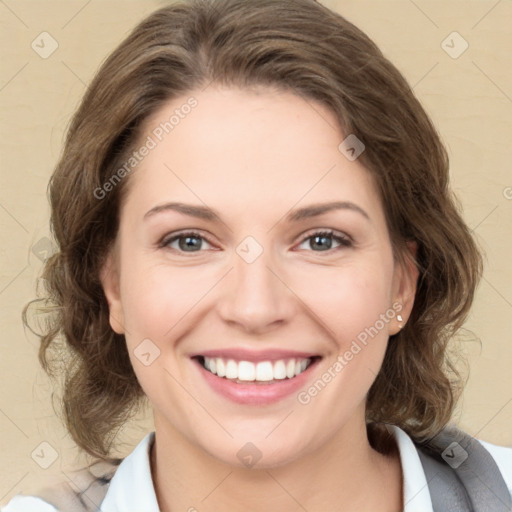 Joyful white young-adult female with medium  brown hair and green eyes